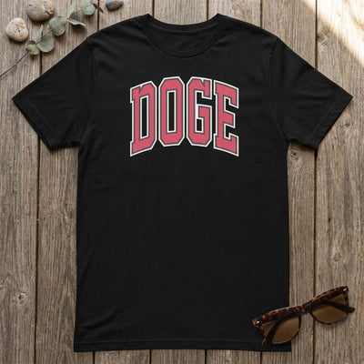Styled flatlay of black DOGE varsity t-shirt on barnwood