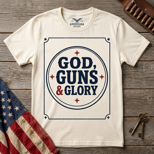 Styled flatlay of God Guns and Glory natural tee with flag