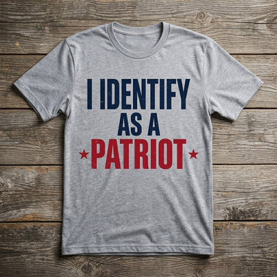 Styled flatlay of I Identify As A Patriot heather tee with sunglasses