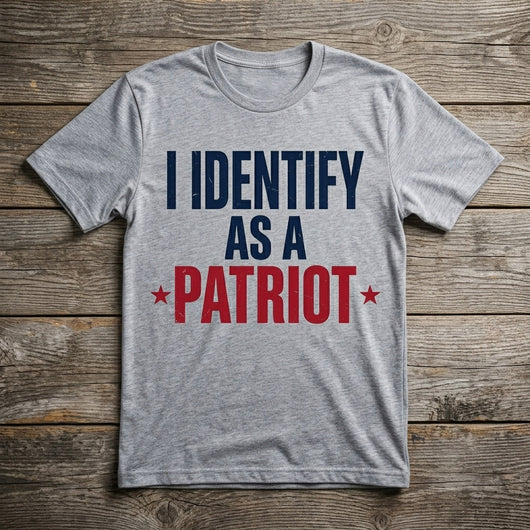 Styled flatlay of I Identify As A Patriot heather tee with sunglasses
