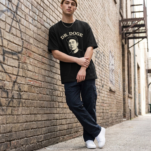 Young man in streetwear wearing Dr DOGE oversized black tee