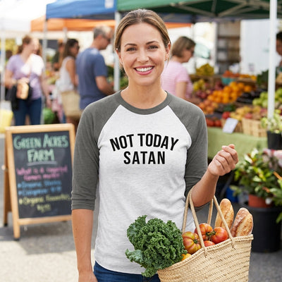 Woman at farmers market wearing Not Today Satan raglan shirt