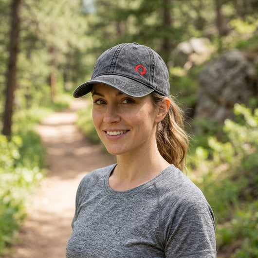 Woman hiking wearing vintage black twill cap