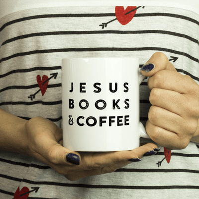White ceramic mug with Jesus Books and Coffee typography design